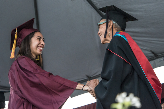 dean congratulating student