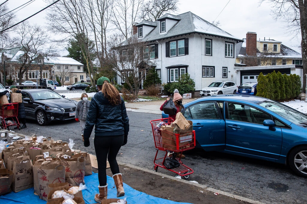 Woman outside distributing food