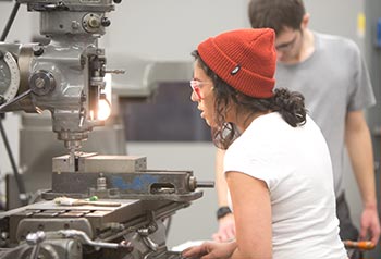 student on cnc mill