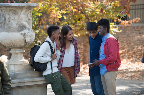 students by sunken garden urn