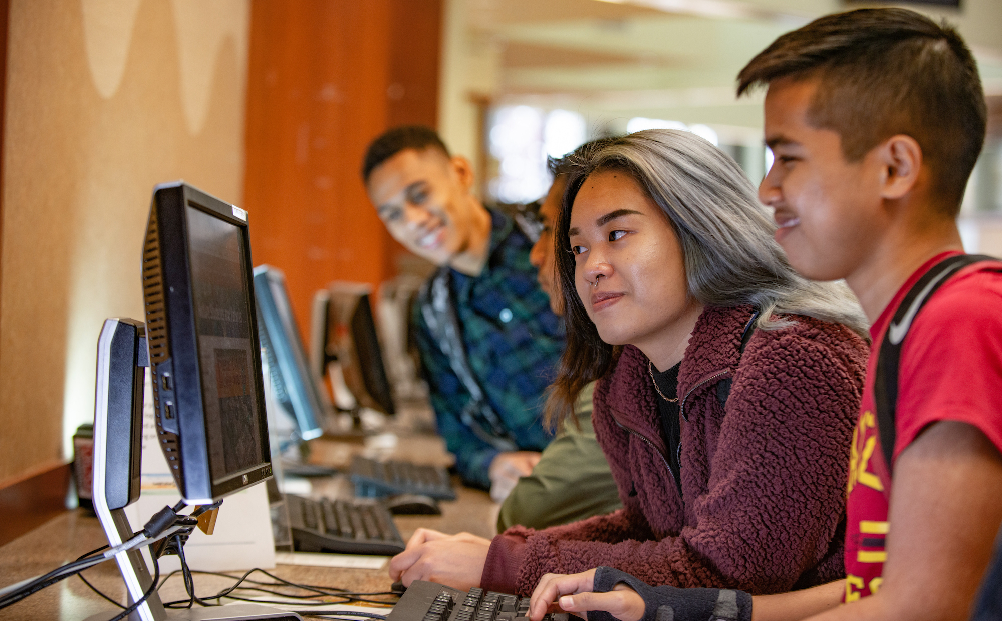 students at computers in the RSS building