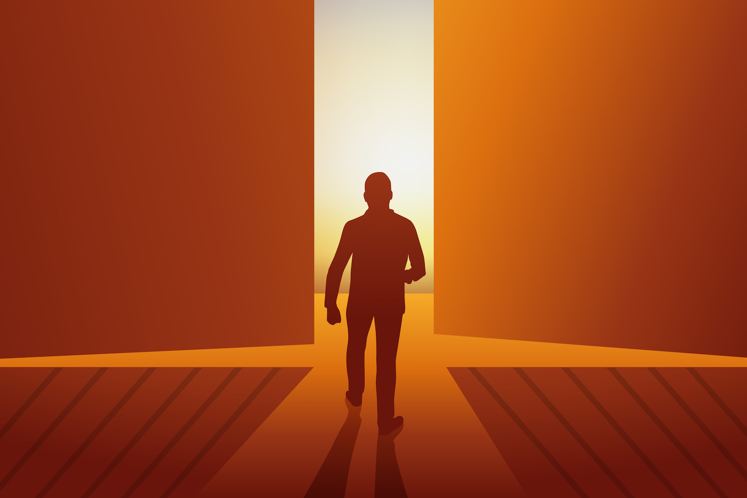 man walking into light