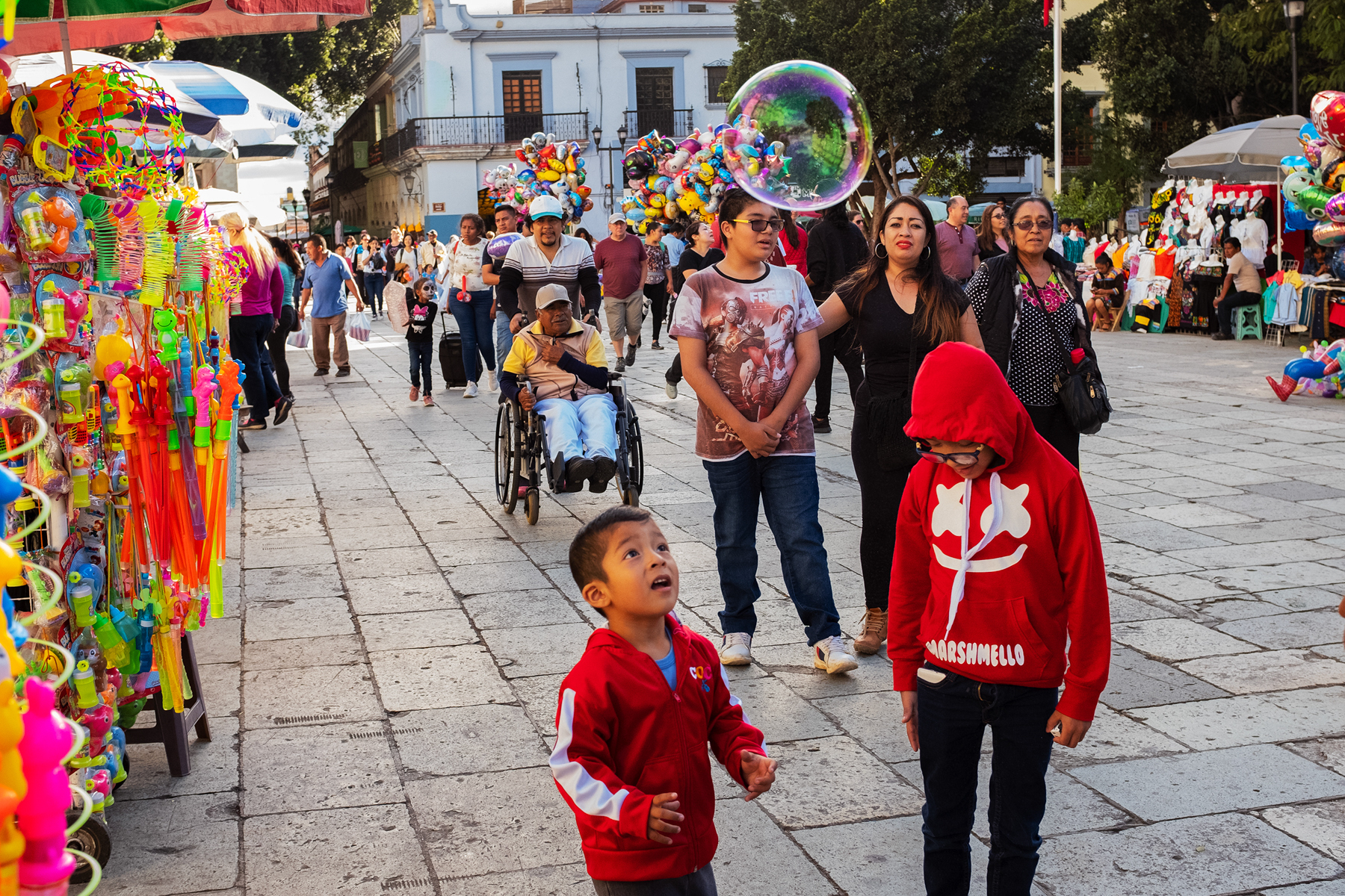 boy looking at bubble